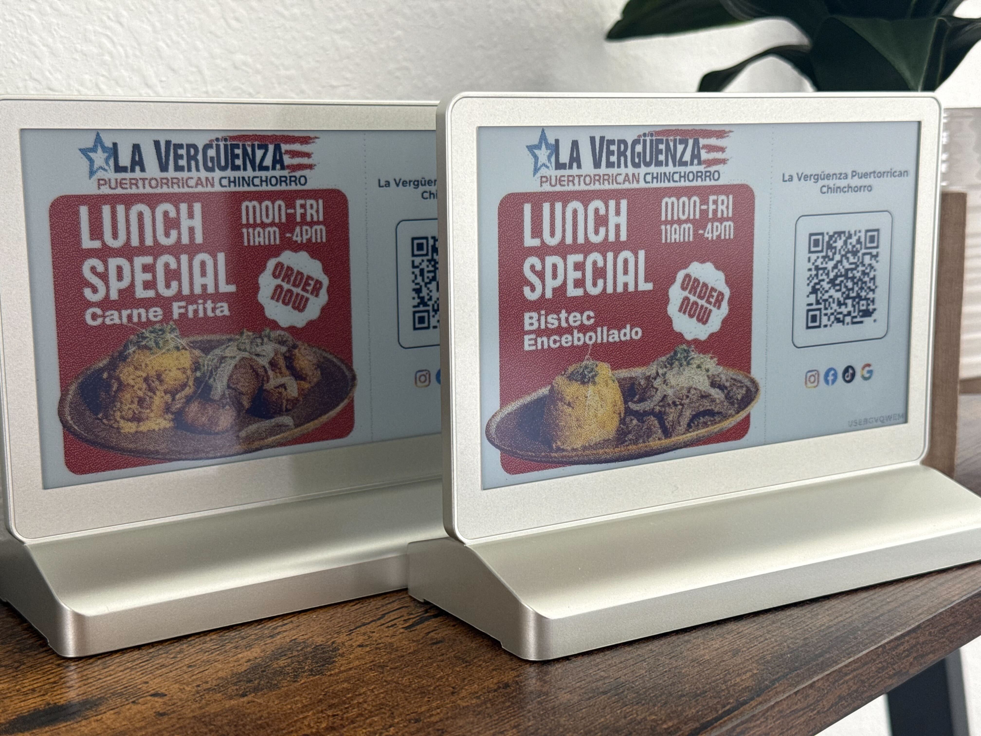 Qbon E-Ink digital display on a restaurant table showing custom merchant content with QR code